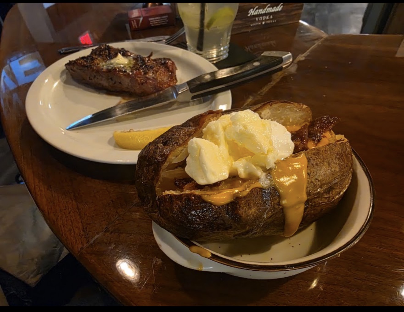 Chargrilled steak with a loaded baked potato